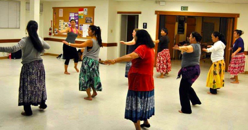 A group of women doing Zumba.